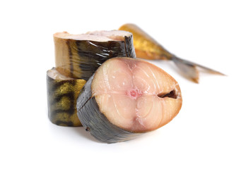 Pieces of smoked Scomber isolated on white background