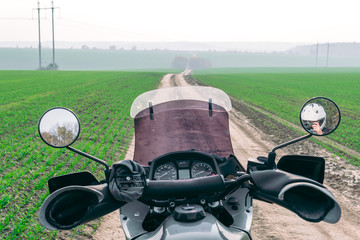 Motorbike on dirt road, enduro, extreme mood, active lifestyle, adventure touring concept, outdoor trailway, dual sport. discover the world on motorcycle