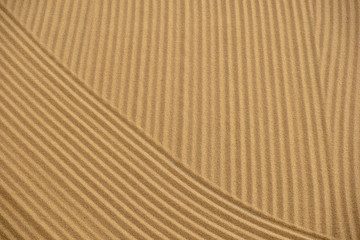 tractor flattening cracked wheat for drying