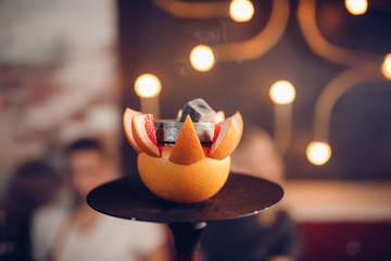 Rest hookah, nightlife of young people smoke shisha in nightclub and bar