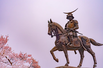 Sendai, Miyagi Prefecture, Japan - April 6, 2018:  A statue of Masamune Date on horseback entering...