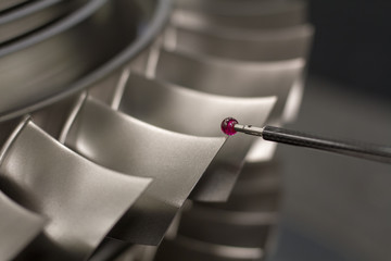 inspect dimension metal parts by CMM after machining process in industrial factory