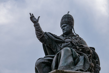 Fototapeta na wymiar Pope Paul V statue Cavour square, Rimini
