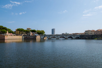 Fototapeta na wymiar Panoramic view of the Tiberius Bridge (Tiberius Bridge) in Rimini.