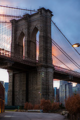 View of the Brooklyn Bridge and Manhattan from the riverside of the East River at sunset - 6