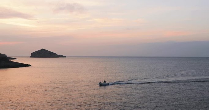 Motorboat Sailing on the Mediterranean Sea Near Les Goudes, Marsaillles, France at Sundown.