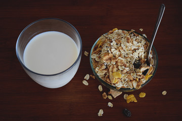 Milk and cereal ready to eat, on the table or in bed