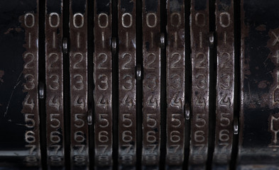 old mechanical calculator,metal digital font