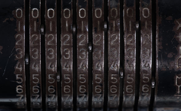 old mechanical calculator,metal digital font