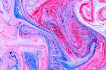 Abstract multicolored background. Fine art of pink blue. Blue pink texture. Colored paint stains in the liquid. Art