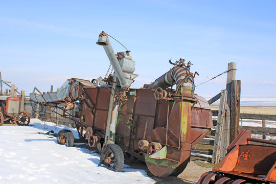 Vintage combine harvester in winter