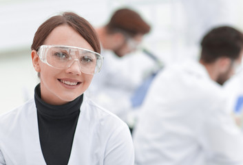 portrait of scientist in laboratory background.