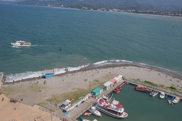 Moorage for boats. View Of Embankment Of The Georgian Resort Town Of Batumi