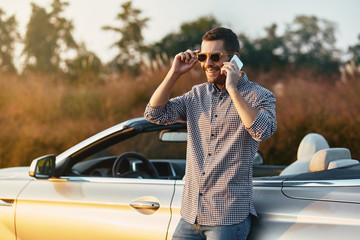 man talking on smartphone
