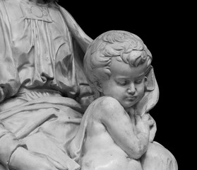 Fototapeta na wymiar Marble statue a child with her mother