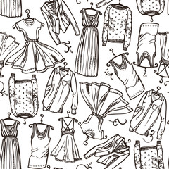 Seamless pattern of women's clothing sketches. Vector ink hand drawn background