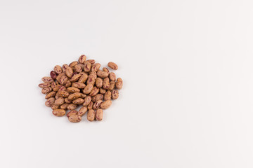 Pile of of beans on white background