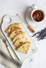 Homemade Pancakes with Honey, Tea, Lavender Flowers, Easy Food Concept Breakfast 