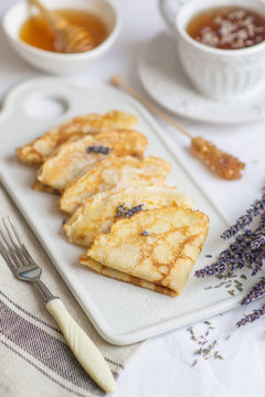 Homemade Pancakes with Honey, Tea, Lavender Flowers, Easy Food Concept Breakfast 