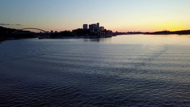 Drone flyby towards Stockholm over water 5