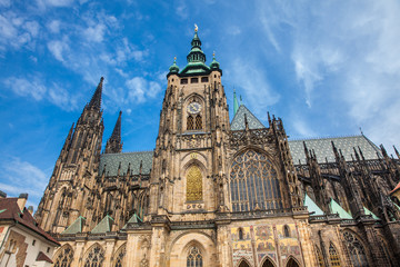Fototapeta na wymiar Facade of the Metropolitan Cathedral of Saints Vitus, Wenceslaus and Adalbert in Prague
