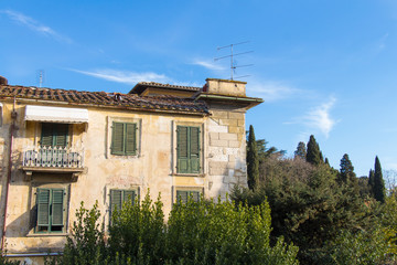 Facade of an old typical Italian building, Fiesole, Italy.