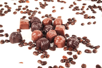 frame for text from grains of black coffee and chocolates