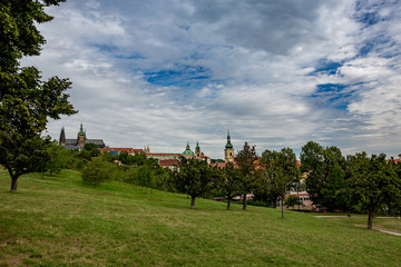 Mala Strana cityscape in Prague as seen from Petrin park when descending from the observation and...