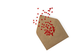 Isolated craft envelope with red paper hearts