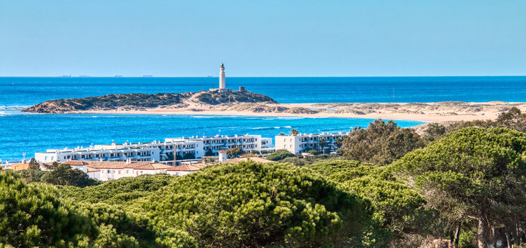 Panoramic view of the Ca&ntilde;os de Meca, with the Trafalgar lighthouse in the background, in a photo taken from the pine forest of La Bre&ntilde;a, Barbate, Spain