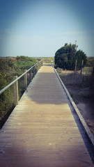 old wooden bridge to cross the way