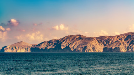 Obraz premium Sea and rocky shores in the fjords of the Gulf of Oman