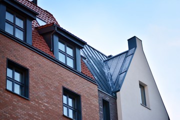 Modern apartment buildings on a sunny day with a blue sky. Facade of a modern apartment building