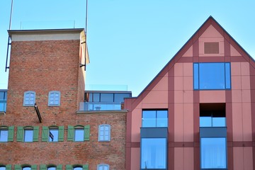 Modern apartment buildings on a sunny day with a blue sky. Facade of a modern apartment building