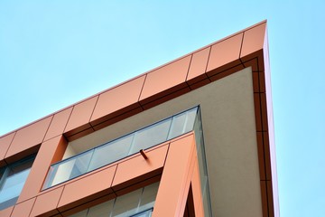 Modern apartment buildings on a sunny day with a blue sky. Facade of a modern apartment building