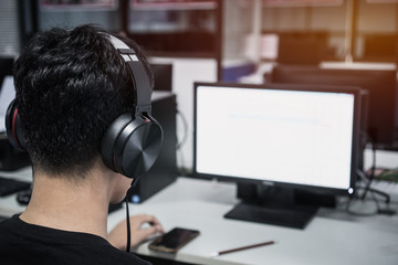Education e-learning foreign languages Concept : Asian Student Young man wearing Headphones...