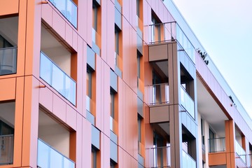 Modern apartment buildings on a sunny day with a blue sky. Facade of a modern apartment building