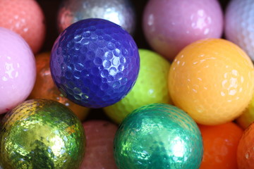 Fototapeta na wymiar Bright batch of golf balls