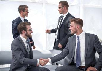 Fototapeta premium business partners shaking hands after signing the contract
