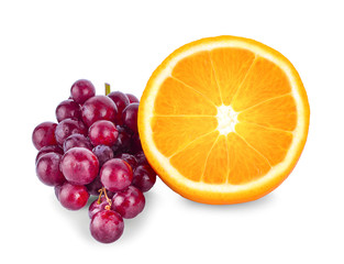 Red grapes and sliced oranges isolated on white background