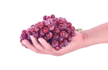 Red grapes on hand  isolated on white background.