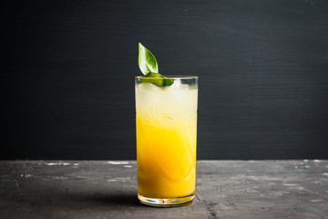 Fresh cocktail with mandarines on the rustic background. Selective focus. Shallow depth of field.