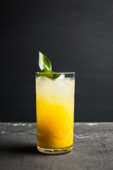 Fresh cocktail with mandarines on the rustic background. Selective focus. Shallow depth of field.