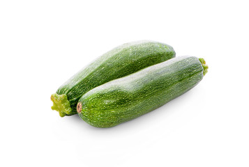 green fresh zucchini isolated on white background