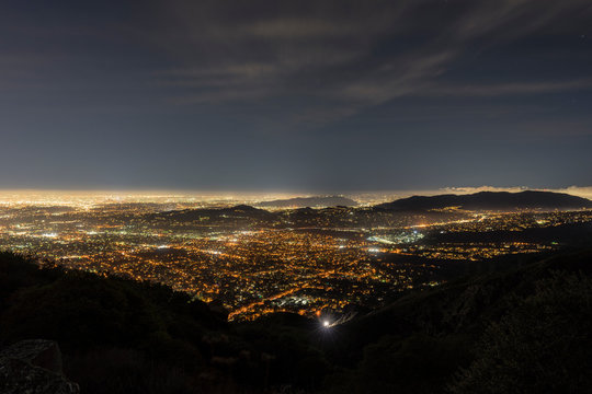 Night Fog View Of Pasadena And Los Angeles From Peak In The San Gabriel Mountains. 