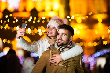 Young couple taking a selfie