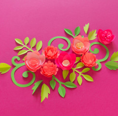 Flower made of paper pink background. Trend color pastel coral.