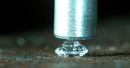 Diamond (intact) about to be smashed by hydraulic press