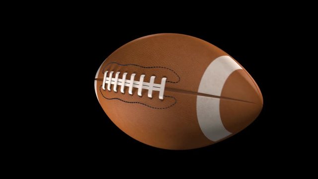 Slow Motion American Football Spiraling Towards Camera Over Black Background.  3D Animation