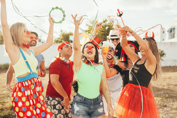 Brazilian Carnival. Group of Brazilian people in costume celebrating the carnival party in the city
